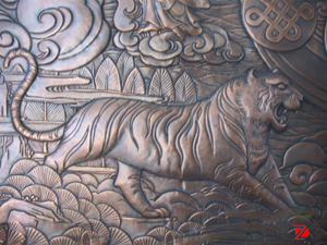 Bronze tiger relief